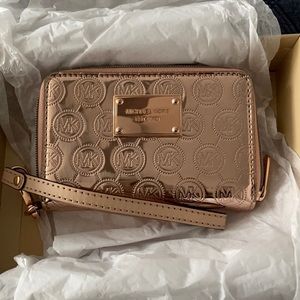 Monogram mirror metallic wristlet